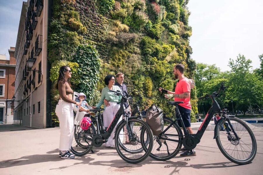 Madrid: Highlights Bike Tour with Optional E-Bike or Tapas - Royal Palace of Madrid + Almudena Cathedral: quick visits, strong payoff