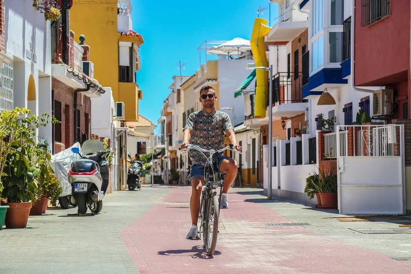 Malaga: Castle Hill and Fisherman Village E-Bike Tour - Starting With the Streets: City Center, Street Art, and Picasso’s Birthplace
