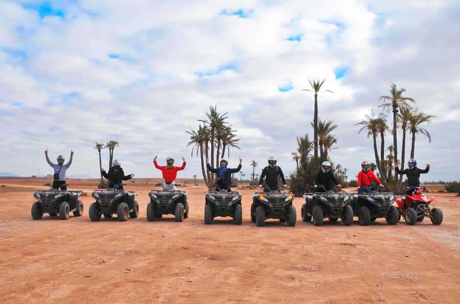 Marrakech Desert & Palm Grove Quad Bike Tour - The quad setup: helmets, goggles, and a test run