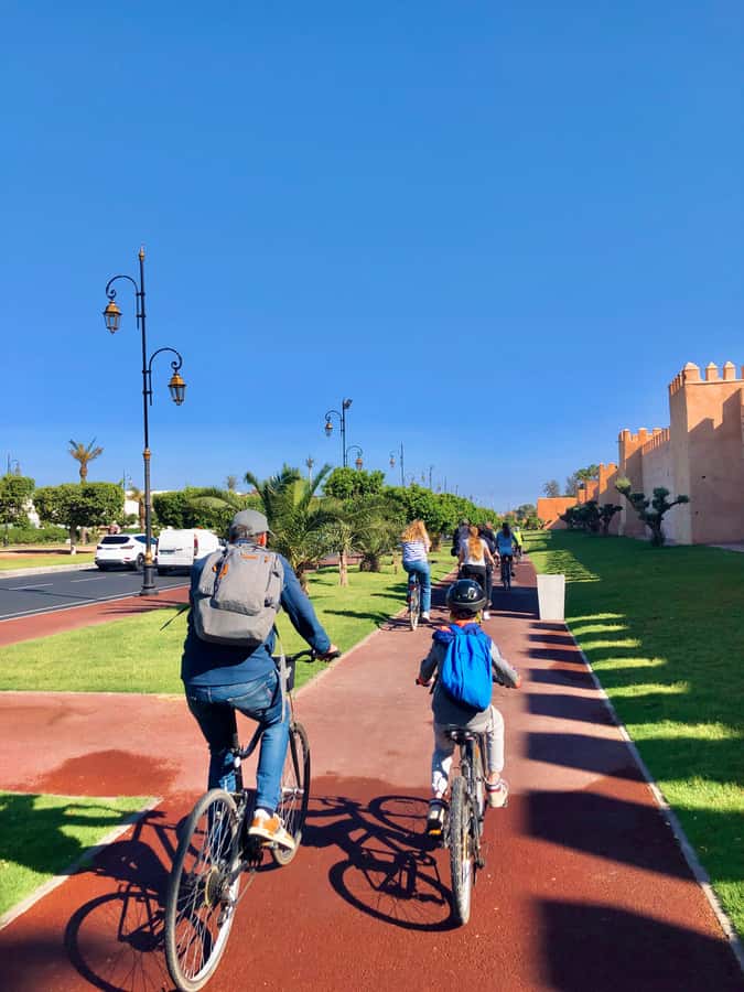 Marrakech:Guided City Cycling Tour - Culture, Colors & Charm - Gueliz on bikes: wide roads, parks, and everyday modern life