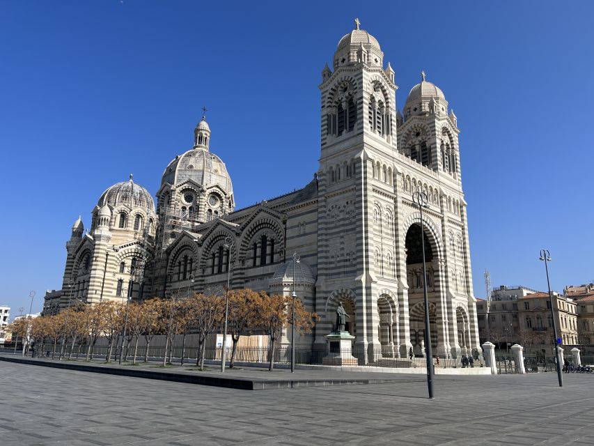 Marseille: Sightseeing E-Bike Tour - Corniche John Kennedy, Catalans, and the colonial armies + Château d’If story