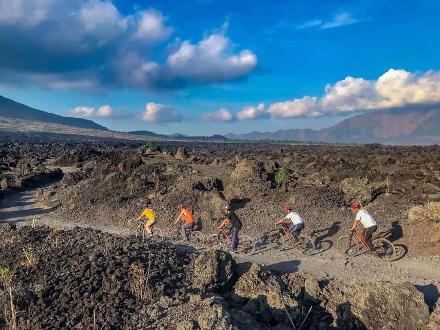 Mount Batur: Black Lava Cycling Tour w/ Natural Hot Spring - Batur UNESCO Geopark: Caldera Within a Caldera and Sacred Stops