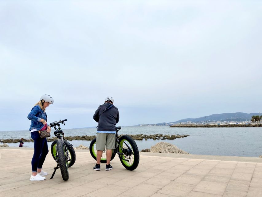 Palma: Guided City Tour with a Fat Tire E-Bike - The shift from old stone to sea air on the bay promenade