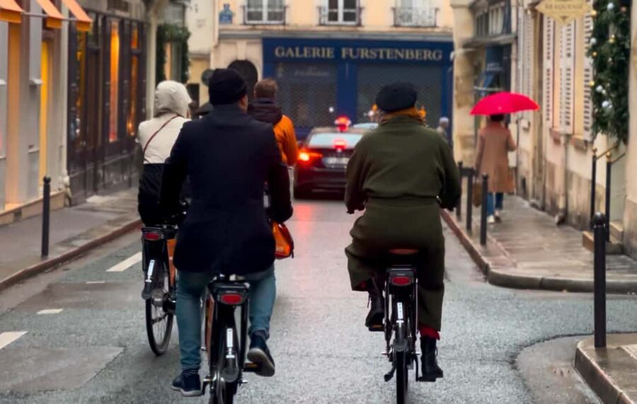 Paris: Secret City Bike Tour Off the Tourist Path - Stop-by-stop: Galerie Vivienne to Place des Vosges on guided mini-pauses