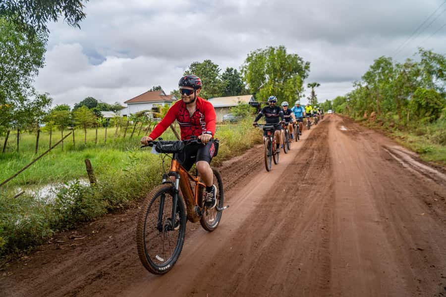 Phnom Penh: Silk Islands Half-Day Bike Tour - Getting Out of Phnom Penh: Pickup, Bike Fitting, and the Ferry Start