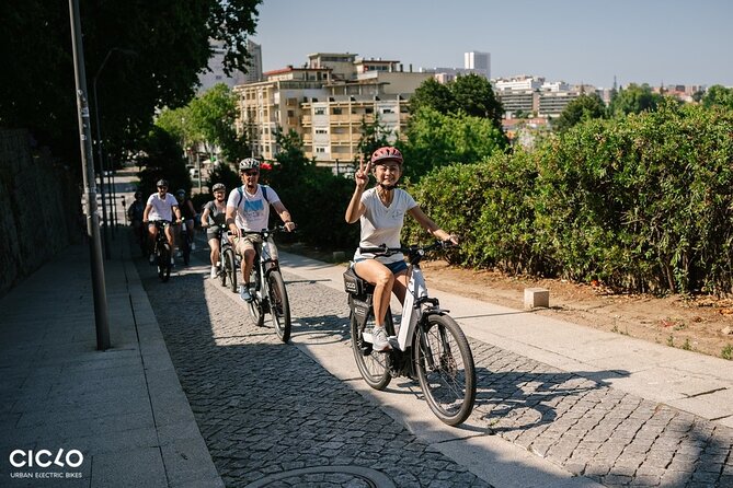 Porto Highlights in 3 Hours E-Bike Tour - Historical, Sightseeing - São Bento Station: azulejos tiles and the Portugal you remember