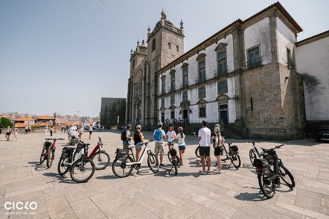 Porto Highlights in 3 Hours E-Bike Tour - Historical, Sightseeing - Avenida dos Aliados and the Clérigos Tower square: big streets, iconic façades