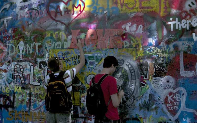 Prague: Classic City Bike Tour - John Lennon Wall and Charles Bridge: how the photos make sense