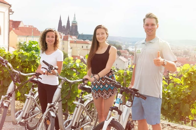 Prague: E-Bike or E-Scooter Tour with A Local Guide - Guides, photo service, and why the small group pace feels personal