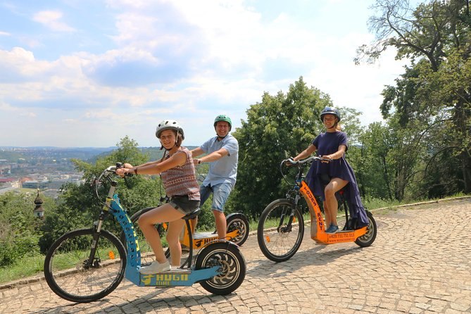 Prague: electric scooter & E-bike guided tour - Getting started at Maltezské Square: helmets, test ride, and calm nerves