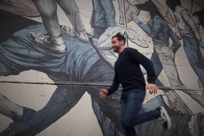 Private Off the Beaten Path: Hidden Urban Art Bike Tour - La Boca street art: soccer, color, and neighborhood identity