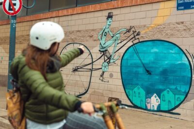 Private Off the Beaten Path: Hidden Urban Art Bike Tour - Calle Lanín and Barracas murals: scale plus meaning