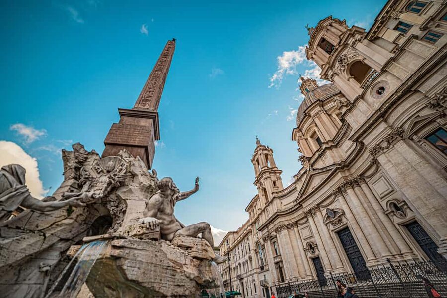 Rome E-Bike Tour with a local! (and a traditional snack) - Weather, ponchos, and the comfort of a semi-private ride