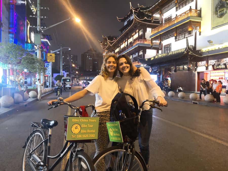 Shanghai: 4-Hour Nightlife Adventure & Tasting Bike Tour - Shanghai at night, from two sides of the river
