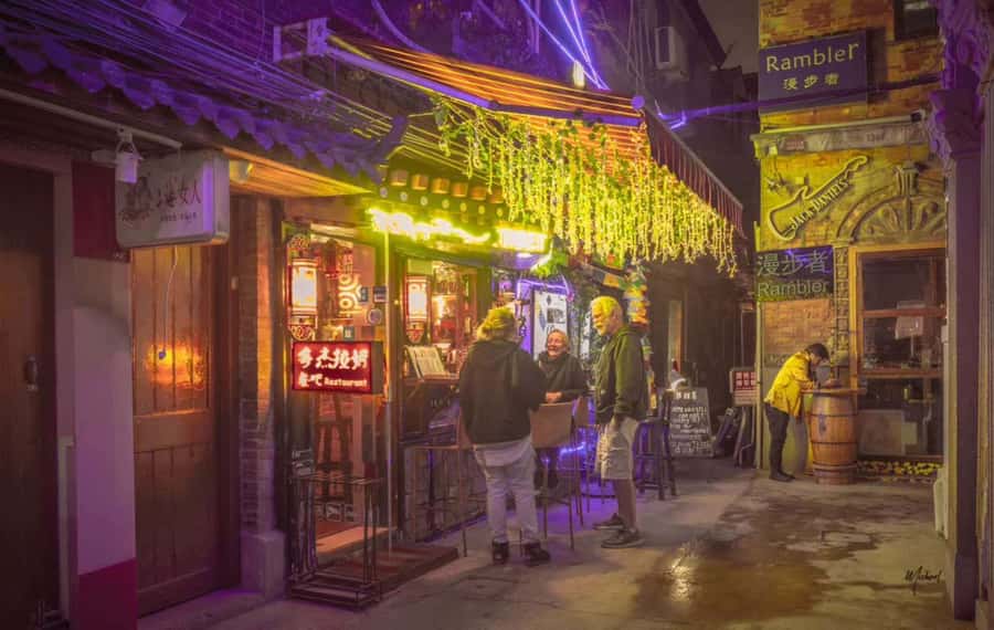 Shanghai: 4-Hour Nightlife Adventure & Tasting Bike Tour - Yu Garden at night: market energy without the maze stress