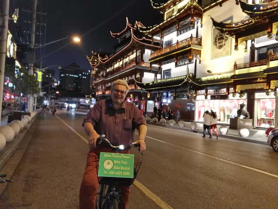 Shanghai: 4-Hour Nightlife Adventure & Tasting Bike Tour - Xintiandi after dark: where food and music share the same block