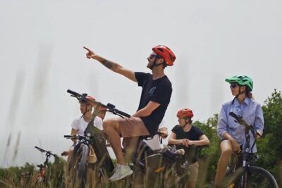 Small Group E-Bike Grand Cayman Ecological Half-Day Tour - West Bay Dock: Fish Fry Culture and a WWII Story