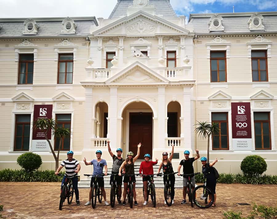 Stellenbosch: Historical Bike Tour & Wine Tasting - Cycling through Stellenbosch University: the final loop back to town