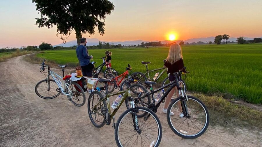 Sukhothai: 2.5-Hours Guided Countryside Sunset Bike Tour - Wood-Carving Factory Stop: Where Tradition Becomes Tangible