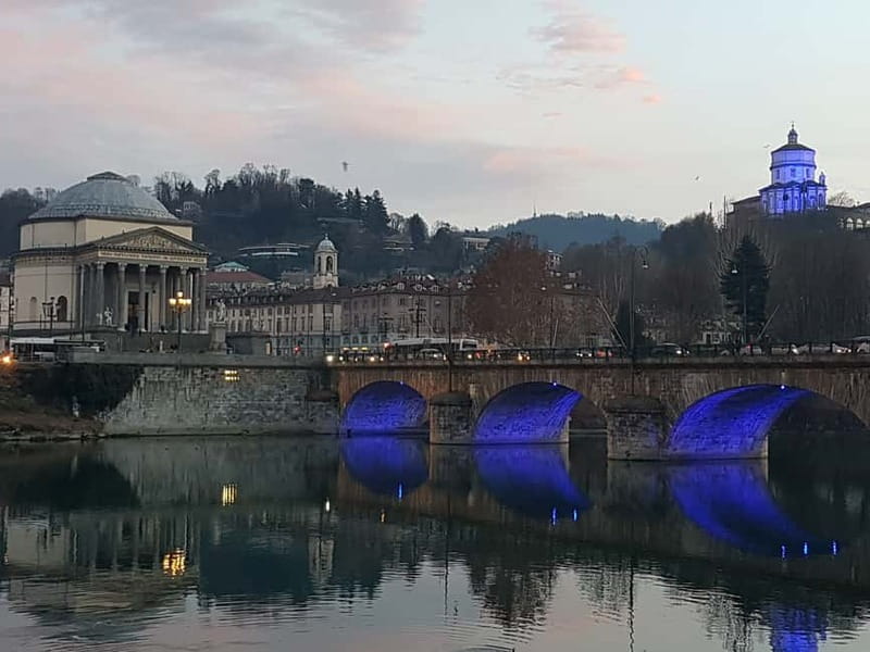 Turin: City Highlights Guided Bike Tour - Piazza San Carlo: cafes, arcades, and the social heart of Turin
