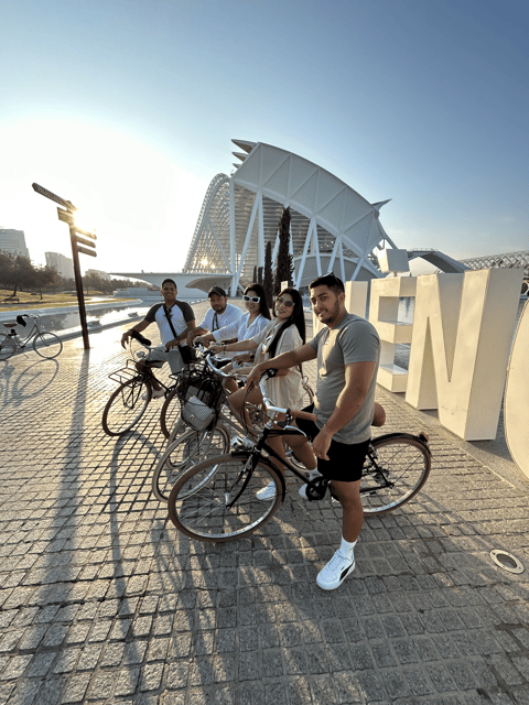 Valencia: Essentials Bike Tour from Ruzafa - Porta de la Mar and Puente de las Flores: city gates and color breaks