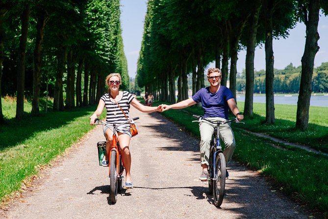 Versailles Full Day Bike Tour with Palace, Gardens, & Picnic - Marie Antoinette stops: Petit Trianon and Hameau de la Reine