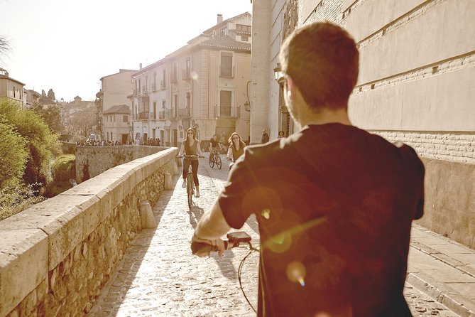 Zooming Through Granada: A Fun-Filled Electric Bike Tour - The guide: names you might hear and the style that works